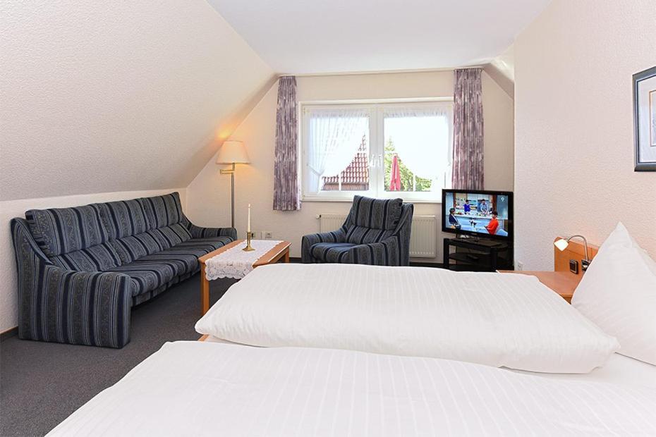 Hotel Garni Poggenstool Neuharlingersiel Esterno foto
